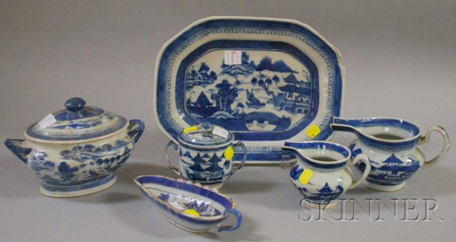 Six Pieces of Chinese Export Porcelain Canton Tab: Six Pieces of Chinese Export Porcelain Canton Tableware, two creamers, a covered serving bowl, a covered two-handled cup, a platter, and a shaped dish, (platter with rim chip, shaped dish with edge gl