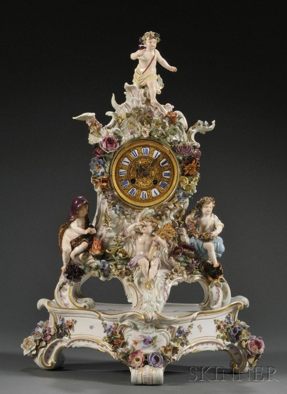 Meissen Porcelain Figural Clock on Stand, Germany,: Meissen Porcelain Figural Clock on Stand, Germany, late 19th century, polychrome enameled and gilded, the floral and foliate case with applied cherubs depicting the seasons, ht. 18 3/4; the triangular