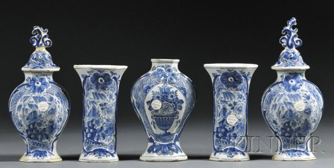 Five-piece Blue and White Delft Garniture, Holland: Five-piece Blue and White Delft Garniture, Holland, 18th century, consisting of two pairs of vases, each with floral landscape cartouches, hexagonal, ht. 8 1/2, and covered, ht. approx. ht. 12 1/2; an