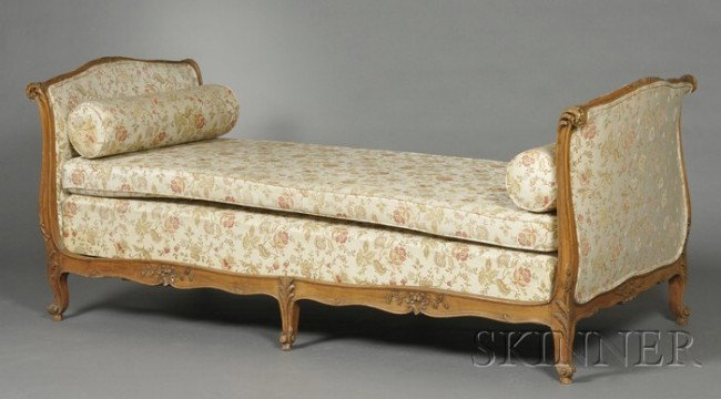 Louis XVI-style Carved Fruitwood Upholstered Daybe: Louis XVI-style Carved Fruitwood Upholstered Daybed, the frame with foliate carving on cabriole feet, ht. 34 1/4, approx wd. 78 1/2, dp. 35 1/2 in.