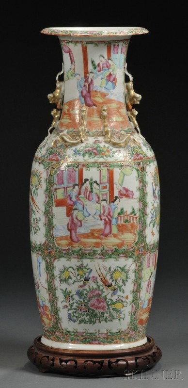 Rose Medallion Decorated Porcelain Vase, China, la: Rose Medallion Decorated Porcelain Vase, China, late 19th century, gilded foo lion handles and applied lizards to shoulder, polychrome enamel decorated panels of figures in a courtyard setting alterna