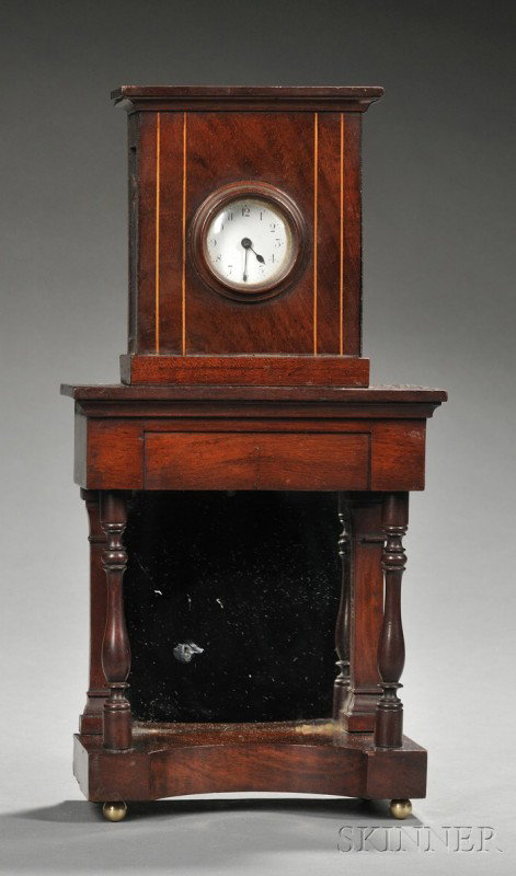 Miniature Mahogany Pier Table/Clock Stand, 19th ce: Miniature Mahogany Pier Table/Clock Stand, 19th century, mirrored back, turned column supports, ht. 15 1/4 in.