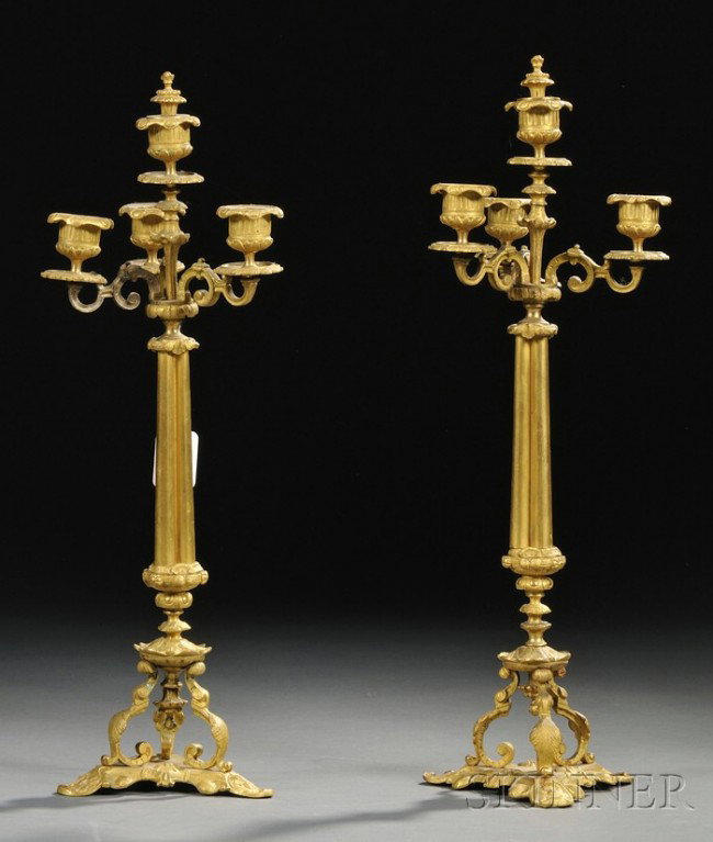 Pair of Bronze Dore Three-light Candelabra, France: Pair of Bronze Dore Three-light Candelabra, France, late 19th/early 20th century, each scrolled arm supported by a trefoil stem set upon a tripod base with scrolled foliate decorated legs, ht. 17 3/4 