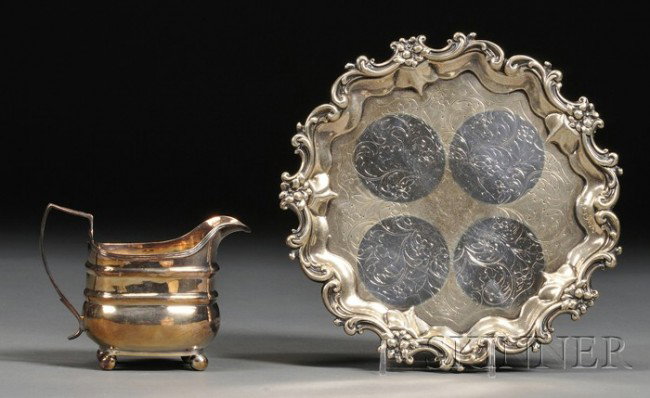 Two English Silver Tableware Items, London, a crea: Two English Silver Tableware Items, London, a creamer, 1810, ovoid, on ball feet, with angular handle, ht. 4, and a waiter, 1837, engraved with leafy scrolls, with C-scroll and flowerhead rim, dia. 8 