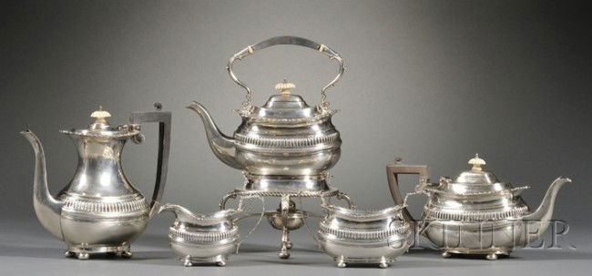 Four Piece Edward VII Silver Tea Set with Similar: Four Piece Edward VII Silver Tea Set with Similar George V Coffeepot, the four piece set Chester, 1904-05, makers' mark GN RH, comprising ovoid teapot, creamer, open sugar, and kettle on stand with bu