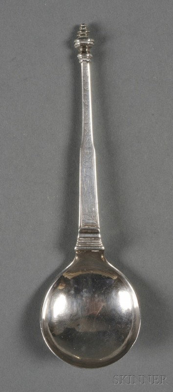 Continental Silver Spoon, c. 1632, likely Scandina: Continental Silver Spoon, c. 1632, likely Scandinavian, the tapering stem engraved with scrolling vine, monogram, and date 1632, with paneled urn-form terminal, and ovoid bowl, lg. 7 3/8 in., approx. 