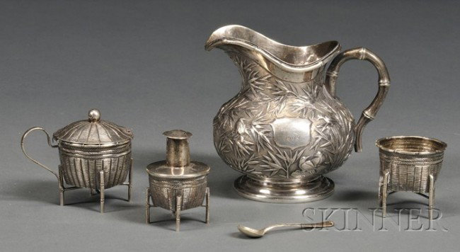 Four Chinese Export Silver Tableware Items, early : Four Chinese Export Silver Tableware Items, early 20th century, a pear-shaped creamer chased and embossed with birds amidst bamboo, ht. 3 7/8, and a small three piece Wang Hing condiment set, with whi