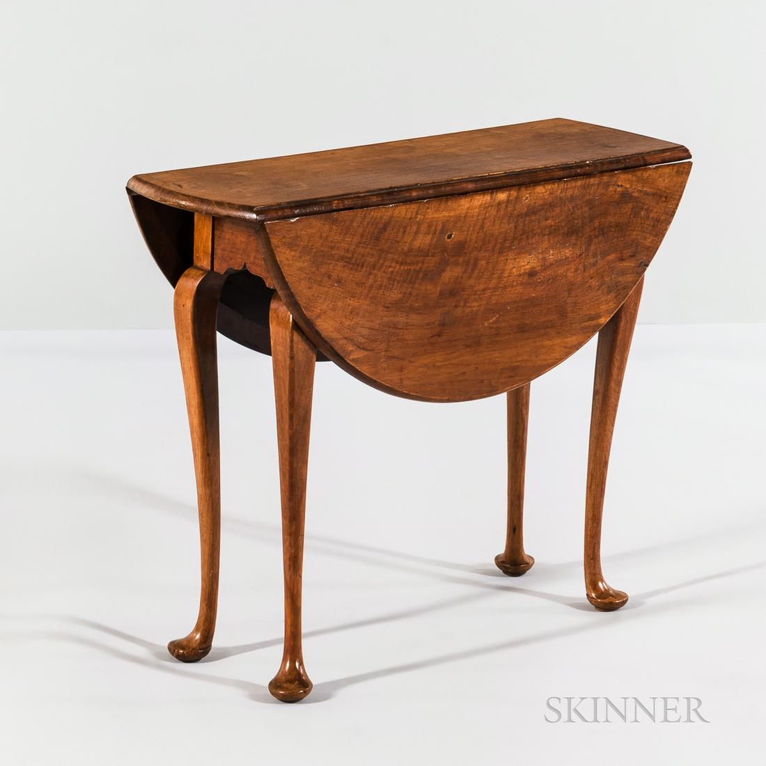 Diminutive Queen Ann Walnut Tea Table, New England, c. 1749-1760, the circular drop-leaf top on four: Diminutive Queen Ann Walnut Tea Table, New England, c. 1749-1760, the circular drop-leaf top on four cabriole legs ending in pad feet, joined by a cutout apron; refinished, ht. 26 1/4, dia. 32 1/2 in.