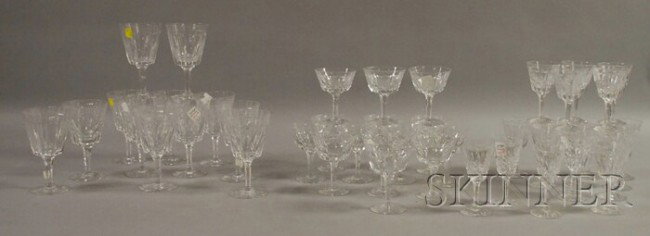 Forty-four Piece Set of Stuart Colorless Cut Cryst: Forty-four Piece Set of Stuart Colorless Cut Crystal Stemware, including twelve goblets, fifteen wines, fourteen champagnes/sherbets, and three cordials. Provenance: From a Martha's Vineyard, Edgartow