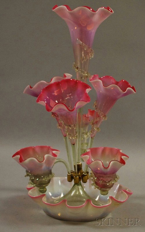 Victorian Art Glass Epergne, of opalescent white : Victorian Art Glass Epergne, of opalescent white shaded to rose pink glass, the ruffled rim bowl issuing seven trumpet-form glass receptacles with applied rigaree, overall ht. 20 in.