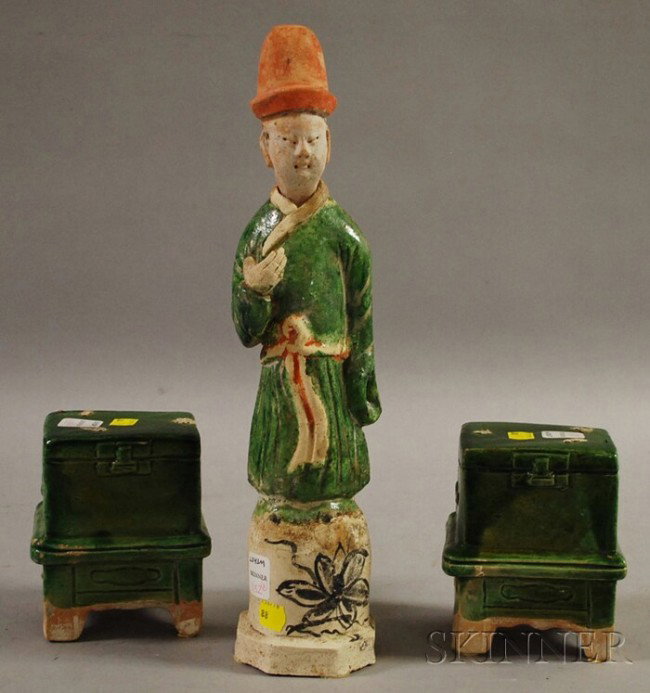 Asian Pottery Figure and Two Green Glazed Pottery: Asian Pottery Figure and Two Green Glazed Pottery Stands, the standing figure with a removable head, wearing a green glazed robe and red hat, ht. 15 1/4, 5 1/2, 5 1/2 in.
