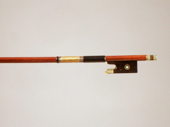 Nickel Mounted Violin Bow, the octagonal stick sta: Nickel Mounted Violin Bow, the octagonal stick stamped GERMANY, weight 60 grams, (without hair).