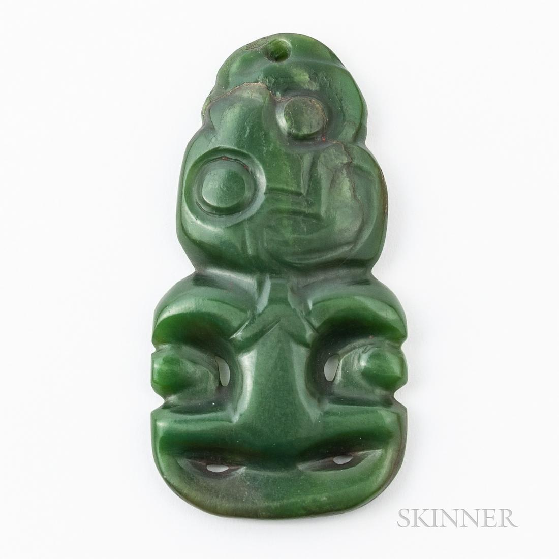 Maori Hei Tiki Greenstone Pendant, 19th century, carved with oval shaped head, chin toward the left (1 of 2)