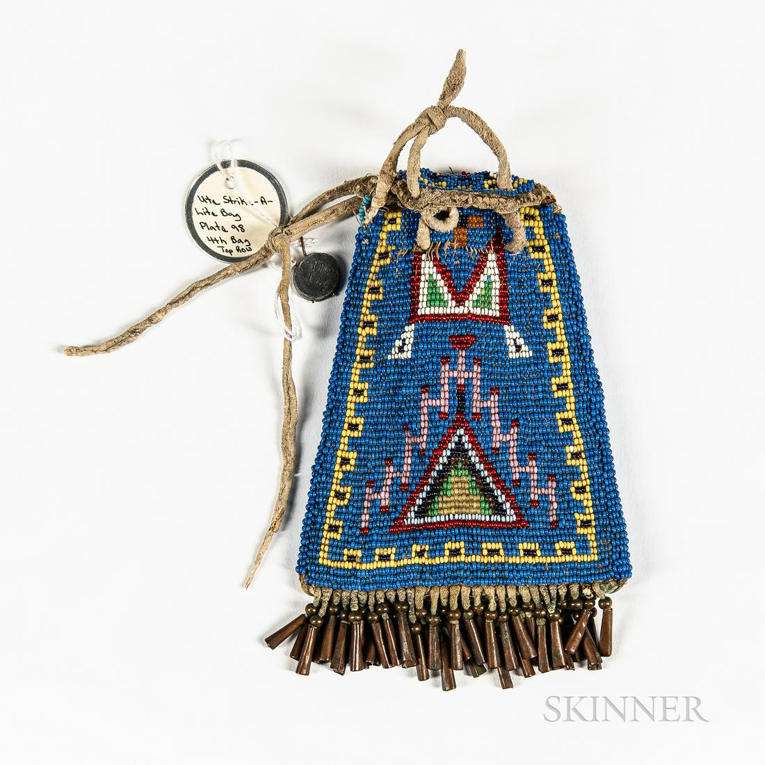 Plains Beaded Hide Strike-a-Lite Pouch, fourth quarter 19th century, beaded on both sides, with (1 of 2)