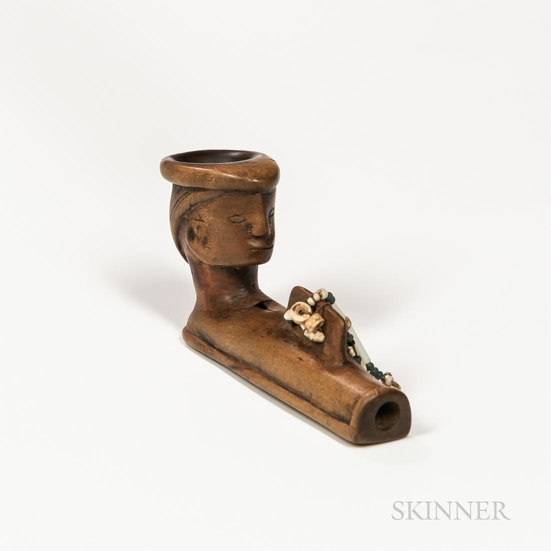 Woodlands Effigy Pipe Bowl, Wyandot, wood bowl of flattened section, with a raised panel pierced and (1 of 4)