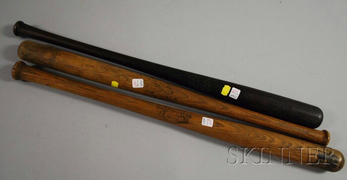 Three Vintage Baseball Bats, a branded "D & M Spor: Three Vintage Baseball Bats, a branded "D & M Sporting Goods, No. 25L, Lite-Wate"; a stamped "Piper Co., Manchester, New Hampshire, No. 8"; and a stamped "Spalding" bat, lg. 33 3/4, 34 1/4, and 33 in.