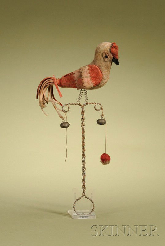 Parrot-form Felt Rattle, Germany, late 19th centur: Parrot-form Felt Rattle, Germany, late 19th century, felt-covered excelsior-stuffed parrot with black shoe button eyes, on wire spring legs, attached to a bent wire handle with two bells, lg. 12 in.