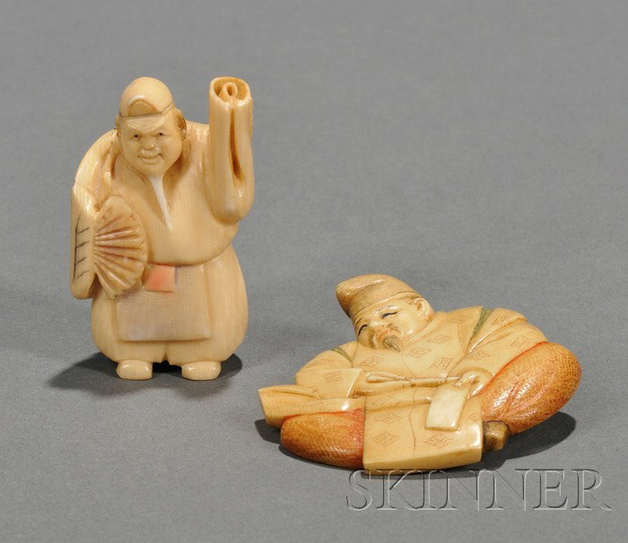 Two Ivory Carvings, Japan, a netsuke carved as a m: Two Ivory Carvings, Japan, a netsuke carved as a man holding a fan, and a flat brooch carved as a seated man holding a calligraphy brush and a letter, lg. 1 7/8, 2 1/8 in.