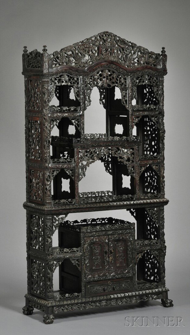 Blackwood Display Cabinet, China, 19th century, wi: Blackwood Display Cabinet, China, 19th century, with twelve display niches in total and a storage cabinet to the lower section, the border elaborately carved in openwork with dragons, bats, and grapev