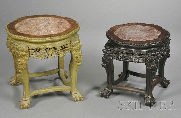 Two Rosewood Tabourets, China, 19th century, each: Two Rosewood Tabourets, China, 19th century, each rounded form with animal feet and foo dog heads at the shoulders, apron carved and pierced with flowers, top inset with a red marble panel, ht. 16, 18