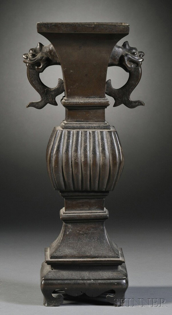 Bronze Vase, China, Ming dynasty (1368-1644), fang: Bronze Vase, China, Ming dynasty (1368-1644), fang gu of a square beaker shape, ribbed body with kylin handles, ht. 16 in.