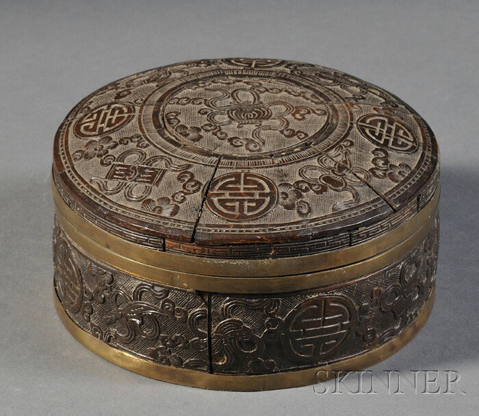 Coconut Shell Box, China, 19th century, surface ca: Coconut Shell Box, China, 19th century, surface carved with shou medallions and the Eight Buddhist Emblems, brass mounts, dia. 6 in.
