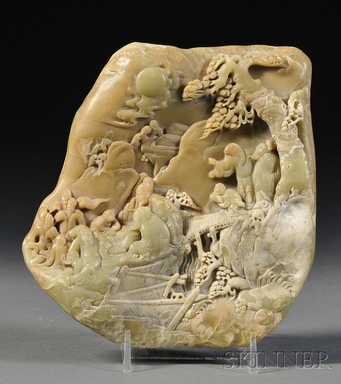 Soapstone Mountain, China, one side finely carved: Soapstone Mountain, China, one side finely carved in high relief with scholars and attendants gathering in a mountainous landscape extending to the other side, the stone of sea green color, 6 1/2 x 5