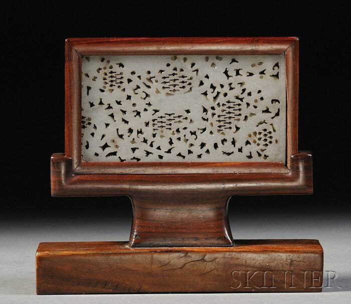 Jade Plaque, China, Yuan dynasty (1279-1368), the : Jade Plaque, China, Yuan dynasty (1279-1368), the rectangular plaque carved in relief with a deer riding on waves and rocks, a monkey on pine and prunus branches, and a sparrow, on a dense openwork gr