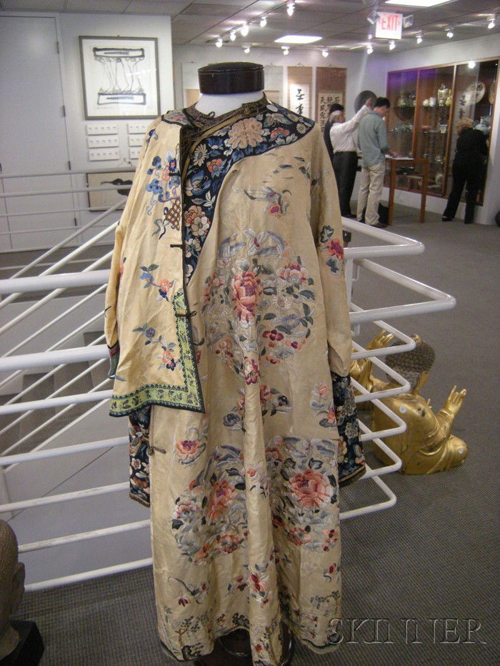 Two Robes, China, late 19th century, a yellow rob: Two Robes, China, late 19th century, a yellow robe with flower roundels, and a light silk top and pants.