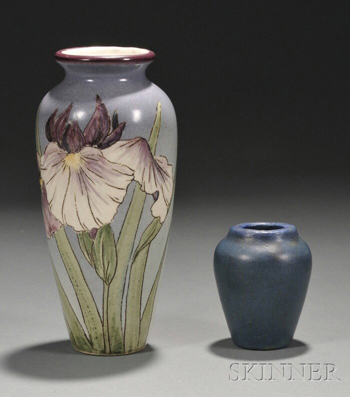 Two Art Pottery Vases Glazed Pottery United States,: Two Art Pottery Vases Glazed Pottery United States, 20th century An elongated oval vase with matte glazed iris motif, marked SPCD MF 81 on base; and a small ovoid matte blue glazed vase, ht. 7 1/4, 3 