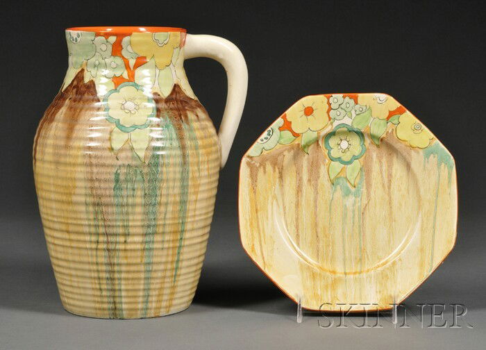 Clarice Cliff Bizarre Ware Single-handled Lotus Ju: Clarice Cliff Bizarre Ware Single-handled Lotus Jug and a Plate Art Deco pottery Staffordshire, England, c. 1930s Ridged surface jug and octagonal plate ornamented with green and yellow flowers above