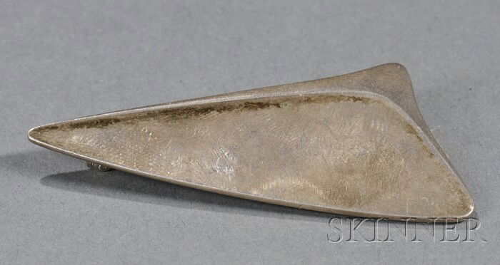 Georg Jensen Brooch Sterling silver Designed by He: Georg Jensen Brooch Sterling silver Designed by Henning Koppel, Denmark, after 1945 With the oval Georg Jensen mark, Sterling, Denmark and no. 327, 1 x 2 in.