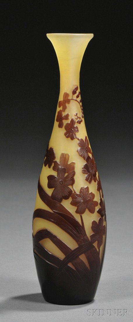 Galle Cameo Glass Vase Art glass France, 1914-36 D: Galle Cameo Glass Vase Art glass France, 1914-36 Decorated with petaled flowers and leaf blades in maroon cameo cut to yellow ground, signed Galle in the cameo, ht. 7 7/8 in.
