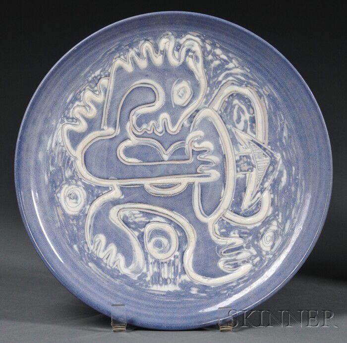 Edwin and Mary Scheier Pottery Plate Decorated gla: Edwin and Mary Scheier Pottery Plate Decorated glazed earthenware New Hampshire, mid-20th century Round blue-glazed plate of red clay with figural sgraffito decoration filled and outlined in white, in