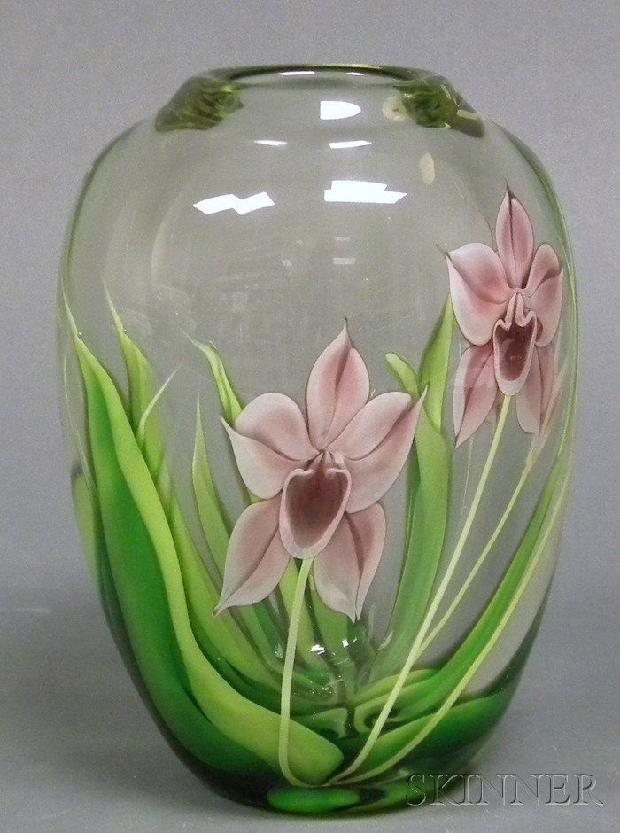Orient & Flume Paperweight Vase Art glass Fourth q: Orient & Flume Paperweight Vase Art glass Fourth quarter 20th century Inverted rim on swollen cylindrical form internally decorated with purple flowers and green blades, paper label, ht. 8 1/2 in.