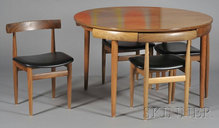 Hans Olsen Dining Table and Four Chairs Teak Frem: Hans Olsen Dining Table and Four Chairs Teak Frem Rojle, Denmark Circular top, the curved back rail of the chairs tuck neatly into the openings on the apron creating a smooth line, the chairs with bla