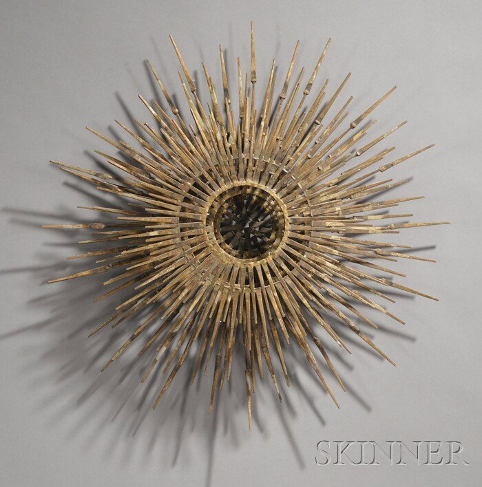 Sunburst Sculpture in the Manner of Curtis Jere Pa: Sunburst Sculpture in the Manner of Curtis Jere Patinated metal Mid 20th century Three graduated rings of radiant metal rods, dia. 27 in.