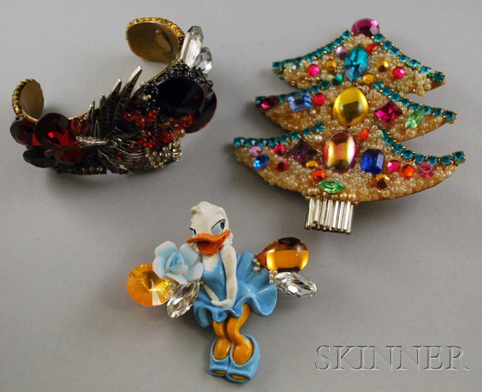 Three Wendy Gell Costume Jewelry Items, a paste an: Three Wendy Gell Costume Jewelry Items, a paste and rhinestone cuff bracelet and two brooches.