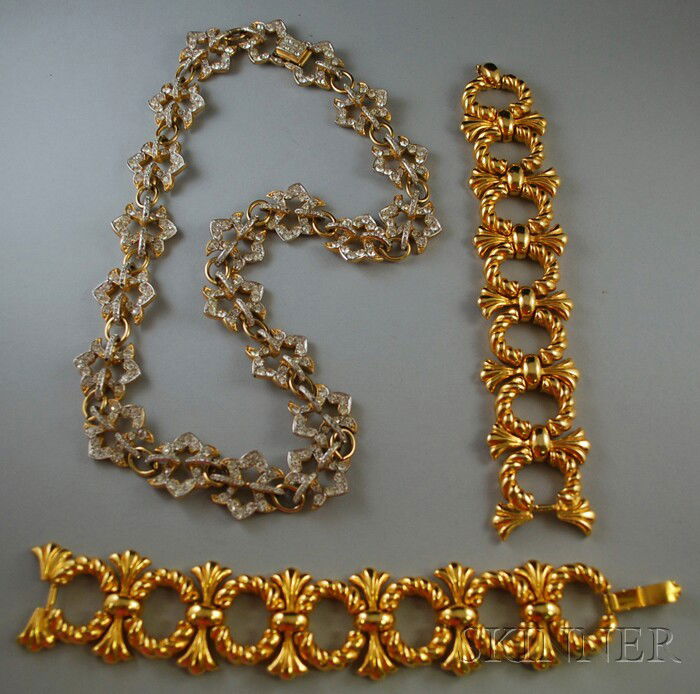 Three Kenneth Jay Lane Gilded Metal Jewelry Items,: Three Kenneth Jay Lane Gilded Metal Jewelry Items, a pair of link bracelets of flexible openwork design, lg. 7, and a gilded metal and crystal rhinestone necklace, links of openwork design, set with n