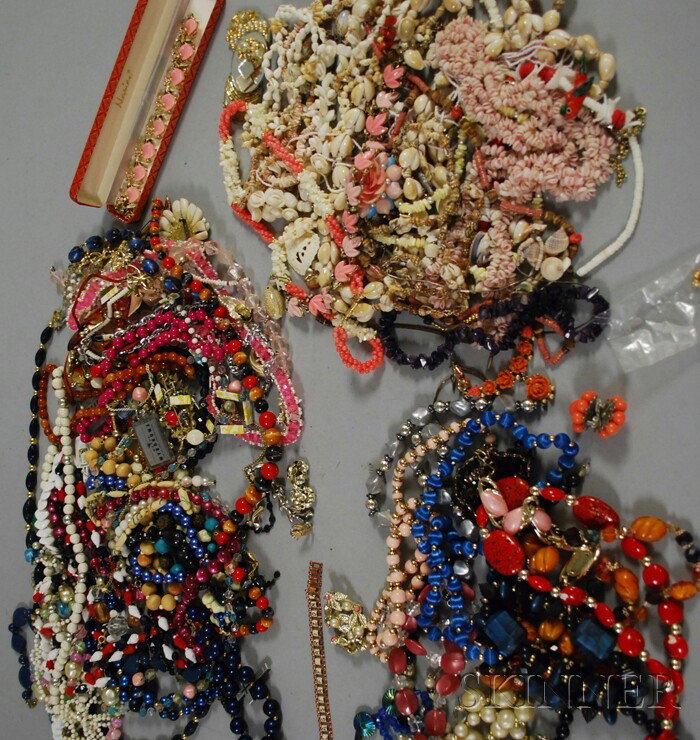Group of Seashell, Wood, and Plastic Costume Jewel: Group of Seashell, Wood, and Plastic Costume Jewelry, including a large number of beaded necklaces.
