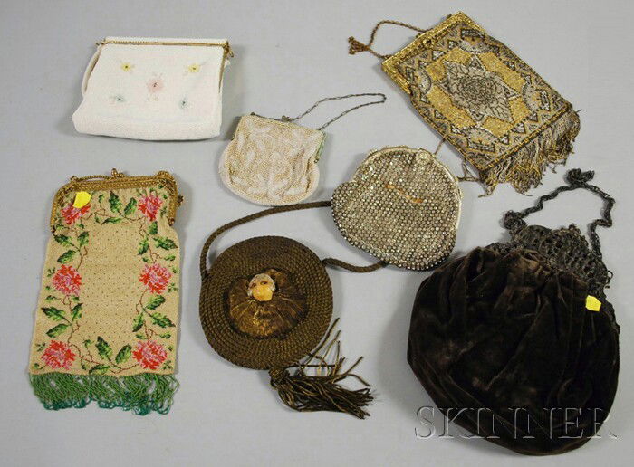 Seven Antique and Vintage Purses, including two an: Seven Antique and Vintage Purses, including two antique beaded purses, two other beaded purses, and a rhinestone purse (damage, missing stones).