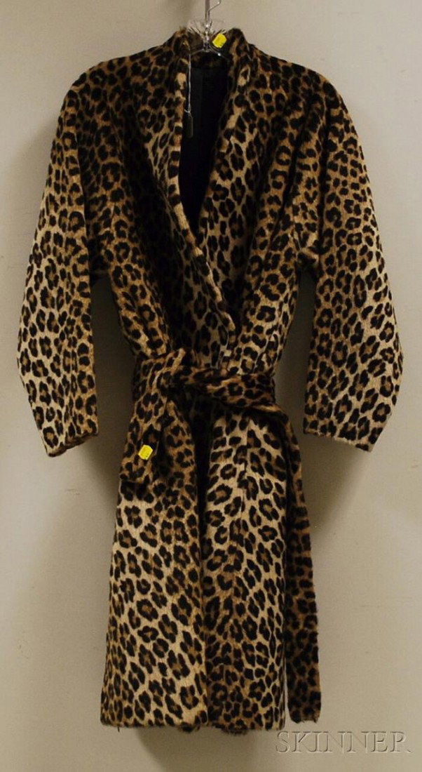Sidney Blumenthal & Co. Woman's "Kilimanjaro" Fau: Sidney Blumenthal & Co. Woman's "Kilimanjaro" Faux Leopard Swing Coat, mid 20th century, belt tie.