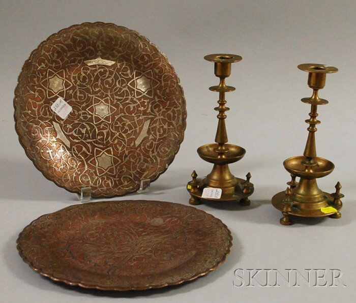 Two Near Eastern Silver Overlay Copper Plates and: Two Near Eastern Silver Overlay Copper Plates and a Pair of Russian Brass Candlesticks, dia. 10 1/2, ht. 8 1/2 in.