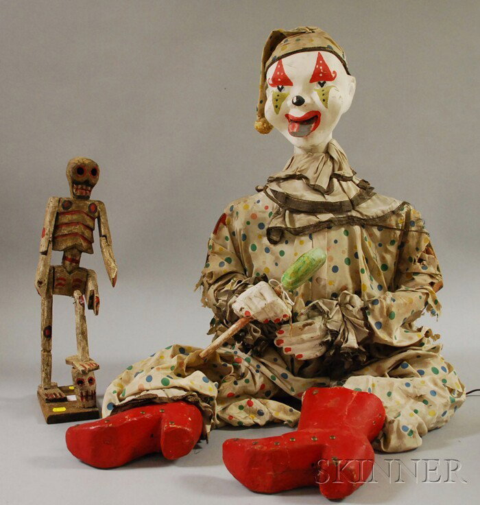 Electric Painted Composition Clown Automaton and : Electric Painted Composition Clown Automaton and a Mexican Carved and Painted Wood Articulated Day of the Dead Skeleton Figure.