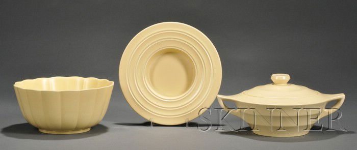 Three Wedgwood Keith Murray Design Matte Straw Sli: Three Wedgwood Keith Murray Design Matte Straw Slip Glazed Items, England, c. 1935-50, a bowl with fluted sides, shape 4126, dia. 8 7/8 in.; a flat bowl/tray shape 3812, dia. 9 1/2 in.; and an annular