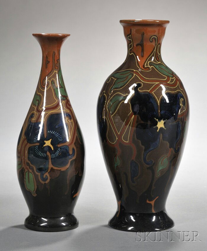 Two Gouda High Glaze Zenith Pottery Vases, Holland: Two Gouda High Glaze Zenith Pottery Vases, Holland, c. 1920, each polychrome decorated in the Clematis pattern with stylized flowers and foliage, ht. 8 5/8, 9 1/4 in.