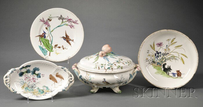 French Faience Aesthetic Movement Partial Dinner: French Faience Aesthetic Movement Partial Dinner Service, third quarter 19th century, printed and painted with various designs of flowers, birds, frogs, and other animals, with gilt rims, comprising a