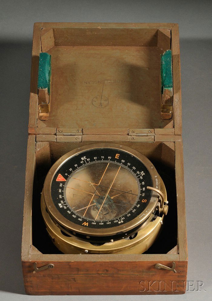 Boxed Brass Compass, with brass spring-loaded case: Boxed Brass Compass, with brass spring-loaded case, 5 1/2-inch glazed opening with stationary dial divided 0-360, cardinal points in block letters and multi-prong needle, box approx. 9 in. square.