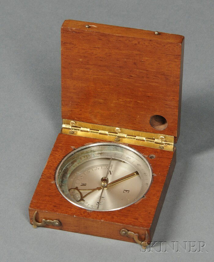 Mahogany Cased Pocket Compass, France, 20th centu: Mahogany Cased Pocket Compass, France, 20th century, with 2 1/4 in. silvered dial, cardinal points in block letters, needle ring calibrated 0-360, steel hand and brass lifter.