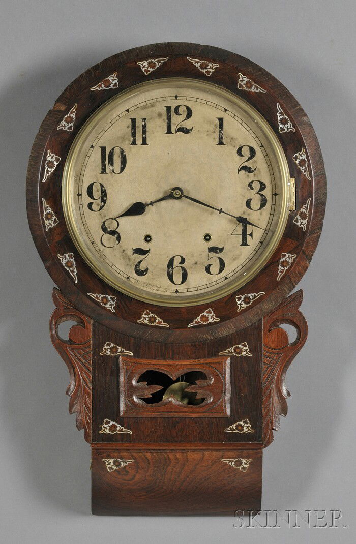 New Haven Rosewood Wall Clock, New Haven, Connecti: New Haven Rosewood Wall Clock, New Haven, Connecticut, c. 1890, with mother-of-pearl decoration around the paper on zinc dial with Arabic numerals, lower drop with carved side ornaments flanking the p